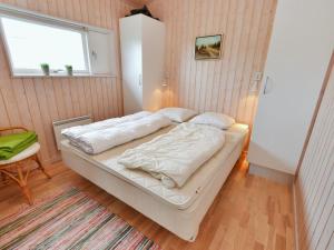 Postel nebo postele na pokoji v ubytování Holiday Home Hadar - 100m from the sea by Interhome