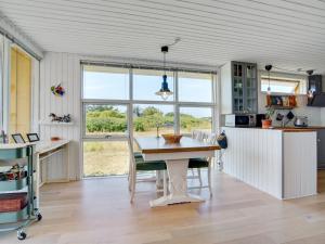 Kuchyň nebo kuchyňský kout v ubytování Holiday Home Uffi - 300m from the sea by Interhome