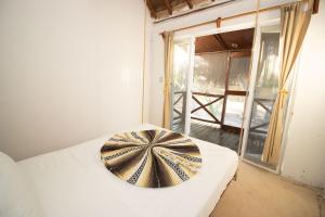 Postel nebo postele na pokoji v ubytování Hotel Ak'Na Holbox