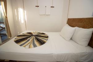 Postel nebo postele na pokoji v ubytování Hotel Ak'Na Holbox