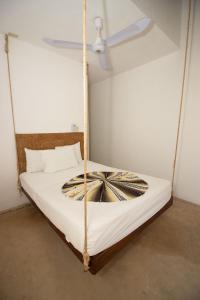 Postel nebo postele na pokoji v ubytování Hotel Ak'Na Holbox