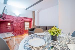 Posedenie v ubytovaní Apartamento 1 en la muralla romana junto a la Catedral