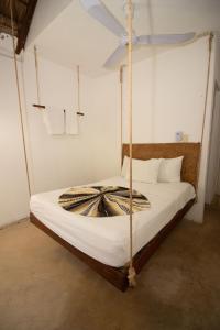 Postel nebo postele na pokoji v ubytování Hotel Ak'Na Holbox