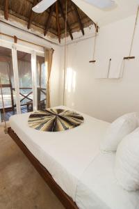 Postel nebo postele na pokoji v ubytování Hotel Ak'Na Holbox + 20 fotografií
