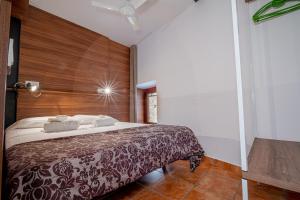 Posteľ alebo postele v izbe v ubytovaní Apartamento 1 en la muralla romana junto a la Catedral