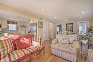 a living room with two couches and a kitchen at Jersey Shore Getaway with Grill Walk to Beach! in Belmar