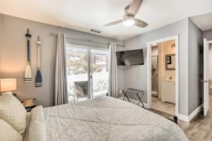 a bedroom with a bed and a ceiling fan at Zephyr Cove Vacation Rental 1 Mi to Lake Tahoe! in Zephyr Cove