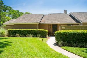 a house with a lawn and a sidewalk at Fisherman's Recess in Ponte Vedra Beach