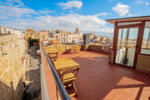 Balkón alebo terasa v ubytovaní Apartamento 1 en la muralla romana junto a la Catedral