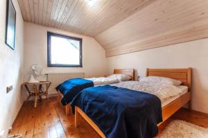 Postel nebo postele na pokoji v ubytování Holiday Chalet near Bled