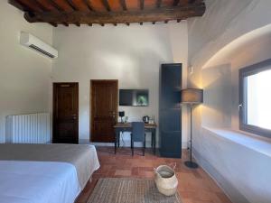 Postel nebo postele na pokoji v ubytování Casale La Gora - B&B di charme