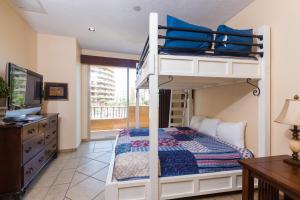 a bedroom with a bunk bed and a desk at Bella Sirena Luxury Resort 205-D in Puerto Peñasco +46 photos