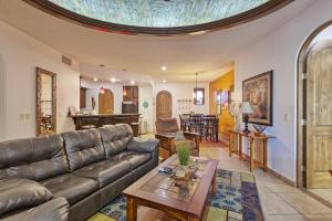 a living room with a couch and a table at Bella Sirena Luxury Resort 205-D in Puerto Peñasco