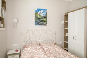 Ένα ή περισσότερα κρεβάτια σε δωμάτιο στο Central Luxury apartment