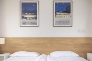 Postel nebo postele na pokoji v ubytování Aparthotel Esencja Warszawy Nowy Świat