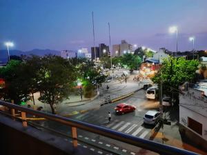 a view of a city street with cars on the road at Roomie Salta by DOT Suites in Salta