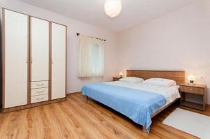 Katil atau katil-katil dalam bilik di Apartments Mladen