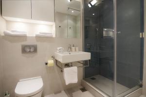 Een badkamer bij Milano Lux