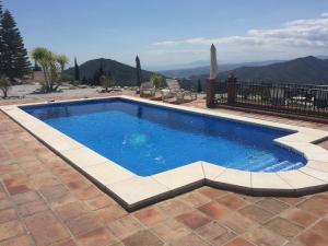 Bazén v ubytování Casa Delfin! Large villa with private pool & mountain views nebo v jeho okolí