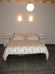 Cama o camas de una habitación en Le Chêne Blanc