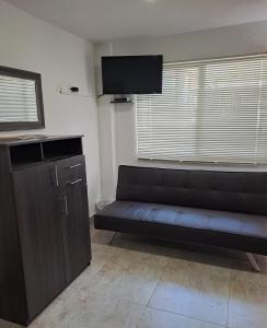 Una televisión o centro de entretenimiento en Villa Layla Santa Marta