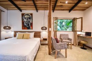 Voodi või voodid majutusasutuse Satta Lodge toas