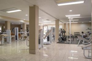 a gym with several treadmills and machines at LP 124 Mesa Views, Grill, Cable, Great Las Palmas Amenities, and Fully Stocked Kitchen in St. George