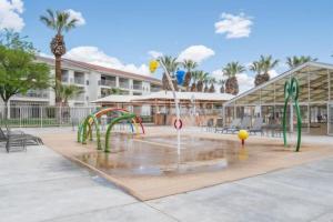 a playground with a water fountain in a park at LP 124 Mesa Views, Grill, Cable, Great Las Palmas Amenities, and Fully Stocked Kitchen in St. George