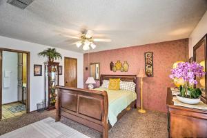 a bedroom with a bed and a ceiling fan at Midland Vacation Rental Close to Downtown in Midland