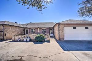 a large brick house with a white garage at Midland Vacation Rental Close to Downtown in Midland