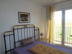 Postel nebo postele na pokoji v ubytování Hostal Moratinos