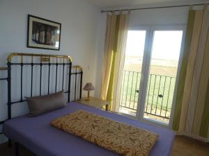 Postel nebo postele na pokoji v ubytování Hostal Moratinos