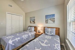 a bedroom with two beds and a window at Family-Friendly Home Near Destin Beaches in Niceville