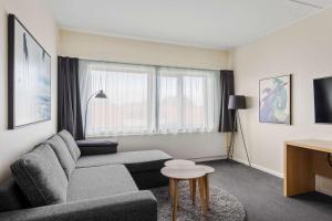 TV a/nebo společenská místnost v ubytování Hotel Sonderborg Strand