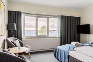Postel nebo postele na pokoji v ubytování Hotel Sonderborg Strand