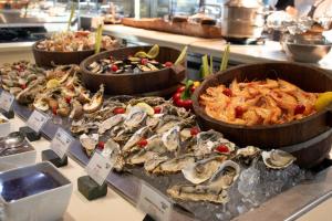 a buffet of different types of seafood on display at Phuket Marriott Resort & Spa, Merlin Beach in Patong Beach
