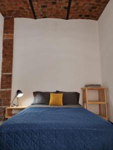 Säng eller sängar i ett rum på Casa Hostal La Esperanza de Don Alfonso