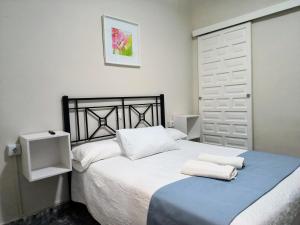 Posteľ alebo postele v izbe v ubytovaní Pension Perez Montilla + 37 fotografií
