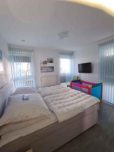 Ένα ή περισσότερα κρεβάτια σε δωμάτιο στο Apartment in Binz - Insel Rügen 43506
