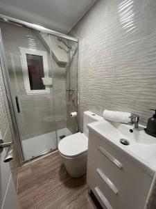 Koupelna v ubytování Acogedor Apartamento cerca de la playa