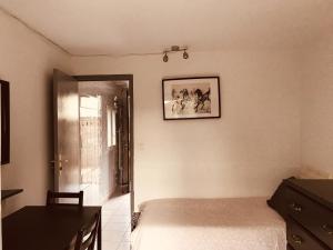 Posteľ alebo postele v izbe v ubytovaní Maison de Longde-Appartement avec 2 chambres