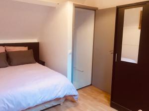 Posteľ alebo postele v izbe v ubytovaní Maison de Longde-Appartement avec 2 chambres