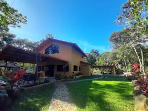 a view of the house from the garden at Caldera River Canyon 