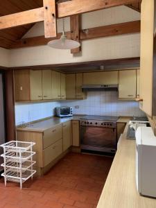 Kuhinja oz. manjša kuhinja v nastanitvi Casa tranquila y central con piscina en Olmué