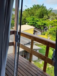 a view from the balcony of a house at Casa centro Porto belo in Porto Belo