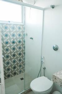 Un baño de Praia da Costa 2 Quartos com Suite Clássico