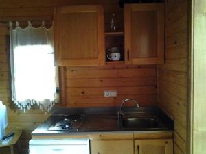 Una cocina o kitchenette en Camping La Eliza