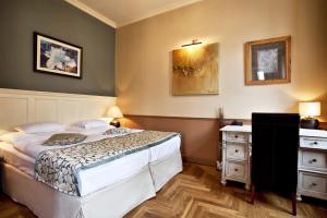 Postel nebo postele na pokoji v ubytování Boutique Hotel Nautilus