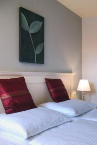 Postel nebo postele na pokoji v ubytování Boutique Hotel Nautilus