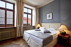 Postel nebo postele na pokoji v ubytování Boutique Hotel Nautilus